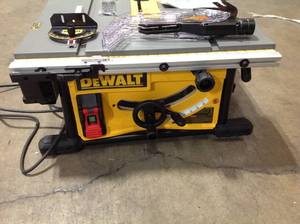 DEWALT 15 Amp Corded 10 in. Job Site Table Saw with Rolling Stand Small Damage at the Leg See Pictures