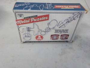 lot 295 image: Metal Puzzles...