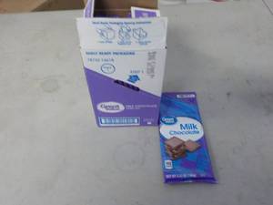 lot 303 image: Box of 12 - 3.52 oz Milk Chocolate ...