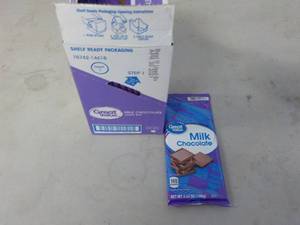 lot 304 image: Box of 12 - 3.52 oz Milk Chocolate ...