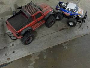lot 12 image: 2 Monster Vehicles as is...