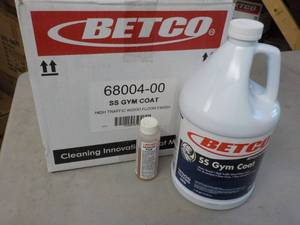 lot 137 image: 1 Gallon Betco SS Gym Coat Wood Flo...