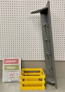 lot 46 image: Gray Wall Shelf with Hanger Pegs  Wooden Crate and Calendar.