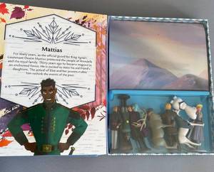 lot 21 image: Frozen Activity Book with Figurine Toys