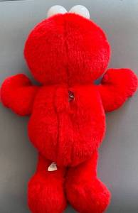 lot 19 image: Tickle Me Elmo Talking Plush Toy
