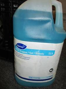 black milk crate with 4 gallons of ...