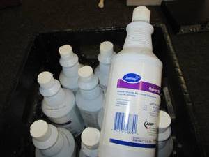 black milk crate with 11 oxivir tb ...