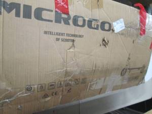 microgo white battery operated scoo...