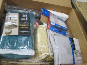 box of curtains and furniture cover...