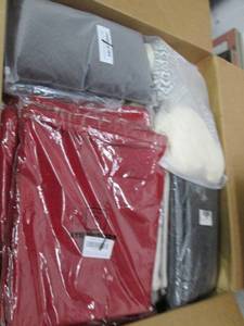 box full of decorative pillow cover...