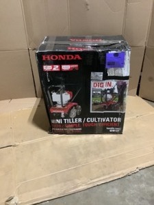 Honda 9 in. 25 cc 4-Cycle Middle Tine Forward-Rotating Gas Mini Tiller-Cultivator. See Pictures