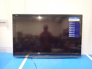 lot 63 image: Sharp Aquos LC-52E77UN 52 TV (includes power and 30 day warranty)