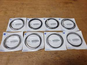 lot 873 image: NOS - Set of 8 Genuine GM Piston Rings - Fits GM 4.8L V8 and 5.3L V8 - Part No. 12670787