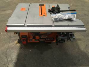 lot 5 image: 10 in. Table Saw with Folding Stand by RIDGID Customer Returns See Pictures