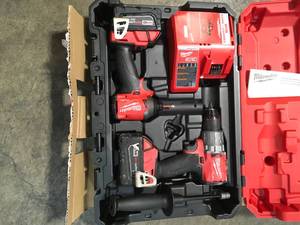 lot 23 image: M18 FUEL 18-Volt Lithium-Ion Brushless Cordless Hammer Drill and Impact Driver Combo Kit (2-Tool) with Two 5Ah Batteries by Milwaukee Customer Returns See Pictures