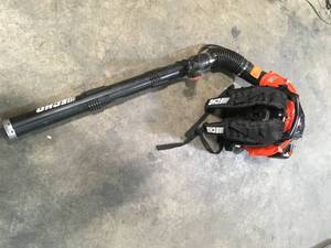 lot 39 image: 216 MPH 517 CFM 58.2cc Gas 2-Stroke Cycle Backpack Leaf Blower with Tube Throttle by ECHO Customer Returns See Pictures
