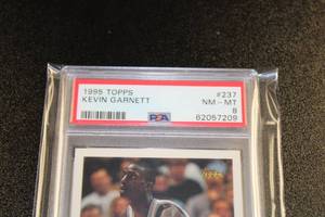 lot 16 image: 1995-96 Topps Kevin Garnett #237 PSA 8 Rookie Card