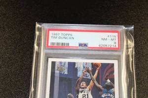 lot 26 image: 1997-98 Topps Tim Duncan #115 PSA 8 Rookie Card