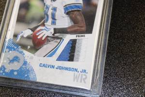 lot 30 image: 2010 Score Prime 4 Color Patch Calvin Johnson Jr #15