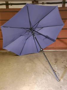 lot 172 image: Like New Hampton Bay 9ft Tilting Blue Deck Table Umbrella