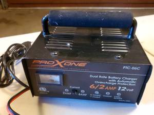 lot 182 image: Pro X One Battery Charger and a Set of Jumper Cables
