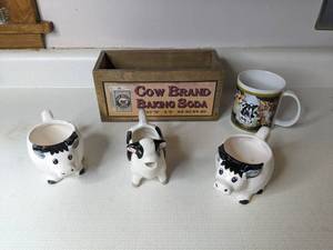 lot 47 image: Sherwood Brands Cow Mug, Cow Brand Baking Soda Box and More