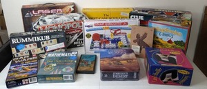 lot 26 image: Game Lot Monopoly, Rummikub, Clue, & More