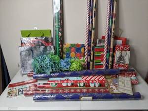 lot 207 image: Collection of Wrapping Paper, Gift Tags, Gift Bags and Tissue (Predominately Holiday) with Tote