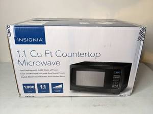 lot 69 image: NEW Insignia 1.1 Cu Ft Countertop Microwave
