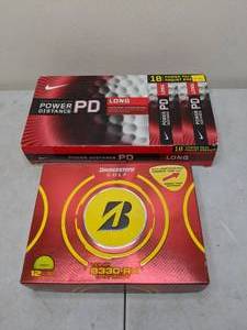 lot 174 image: Lot of Golf Balls by Bridgestone and Nike