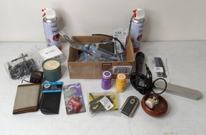 lot 241 image: Not the Kitchen Sink Lot Paint, Plugs, Iron On Patches, Pet Tag, Air Duster, Candle and More