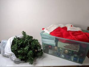 lot 216 image: Christmas Decor Christmas Tree, Stockings, Buble Lite Set, Icicle Lights, Colorful Ornaments and More