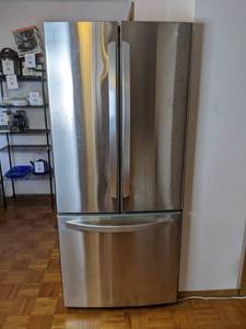lot 3 image: Almost New Stainless Steel French Door 22 cu. ft. LG Refrigerator
