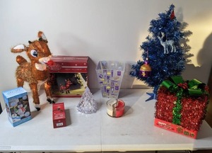 lot 211 image: Christmas Decor Inflatable Frosty the Snowman, Tinsel Present, Rudolph, Mini Tree Lights and Much More