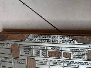 lot 137 image: Wall Art - Print Press Plate - Mounted On Wood