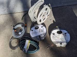 lot 296 image: Collection of Garden Hoses and Reel