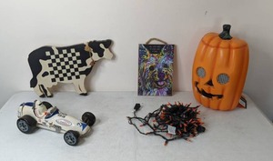 lot 277 image: Beautiful Ezra Brooks Race Car Decanter, Light up pumpkin and more