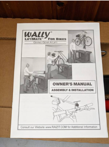 lot 330 image: Wally LiftMate Bike Lift Wall Storage - Still in Box