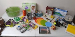 lot 370 image: Mixed Lot of Diapers, Fishing Pole, Corded Phone, Paper Airplanes and More