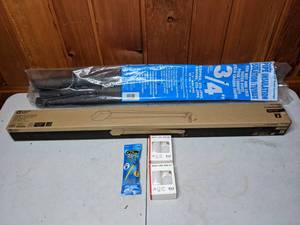 lot 354 image: Pipe Insulation, Glow Bars, Commercial Electric Shop Light, and Light Bulbs