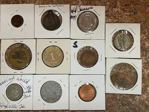 lot 43 image: 11 Assorted Tokens