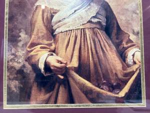 lot 69 image: Framed Print of Girl Holding Fruit in Apron
