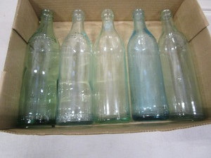 lot 80 image: Vintage Clicquot Club Bottles