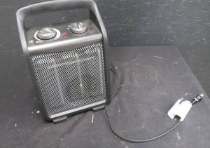 PLUG IN LITTLE HEATER