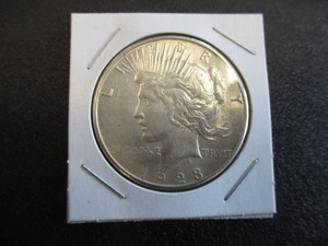1923-S Silver Peace Dollar - Cartwheel Effect and Mint Luster - Beautiful Coin.