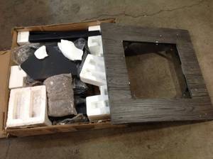 30 in. W Square Wood Look Resin Mantel LP Gas Fire Pit with Integrated Electronic Ignition, Lava Rock and Included Cover by Endless Summer Customer Returns See Pictures