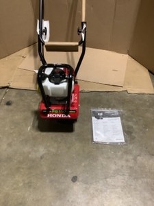 Honda 9 in. 25 cc 4-Cycle Middle Tine Forward-Rotating Gas Mini Tiller-Cultivator. See Pictures