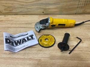 lot 67 image: DEWALT 7 Amp 4-12 in. Small Angle Grinder with 1-Touch Guard