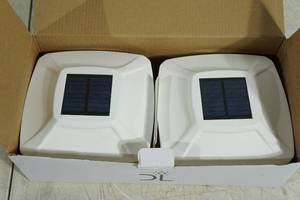 lot 179 image: Davinci Lighting Solar Post Cap Lights