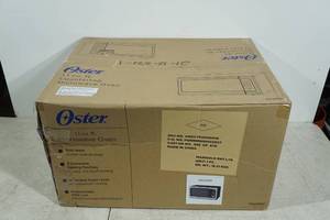 lot 32 image: Oster 1.1 Cu Ft Countertop Microwave Oven - 1000 Watts
